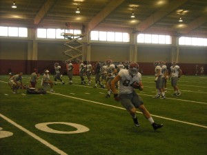 Alabama tight end Brian Vogler catches a pass from AJ McCarron in Wednesday's practice. (Photo by Brett Hudson)