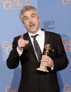 Alfonso Cuarón, the director of Gravity, with his Best Director Golden Globe