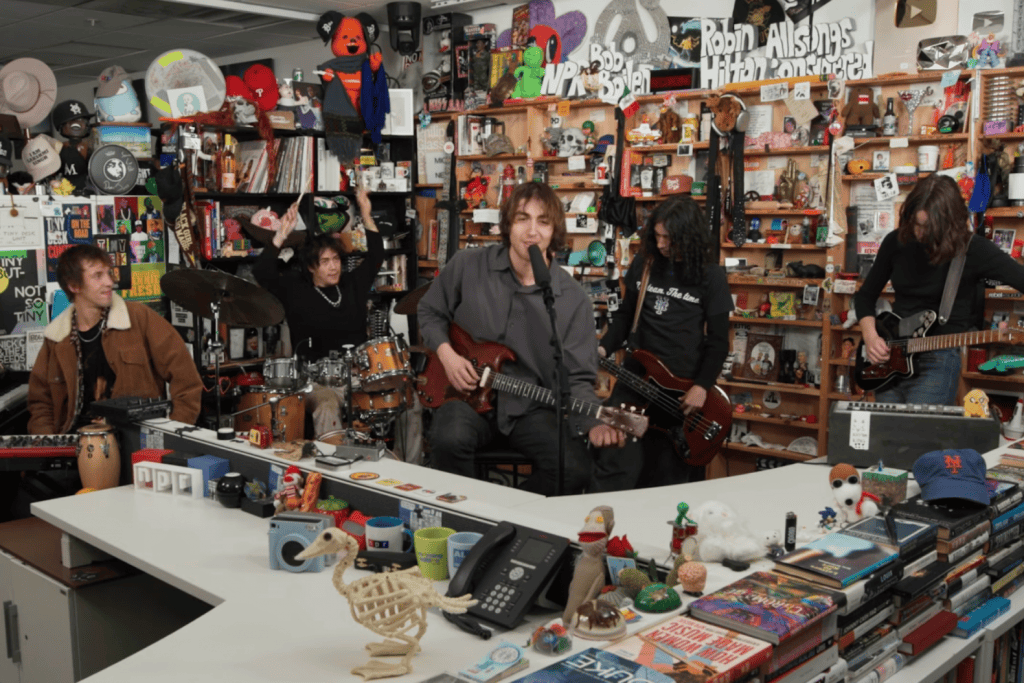 5 Members of the band Geese behind the NPR Tiny Desk set.